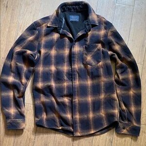 Nomad Men's Black and Orange Checkered Shirt Jacket
Never worn